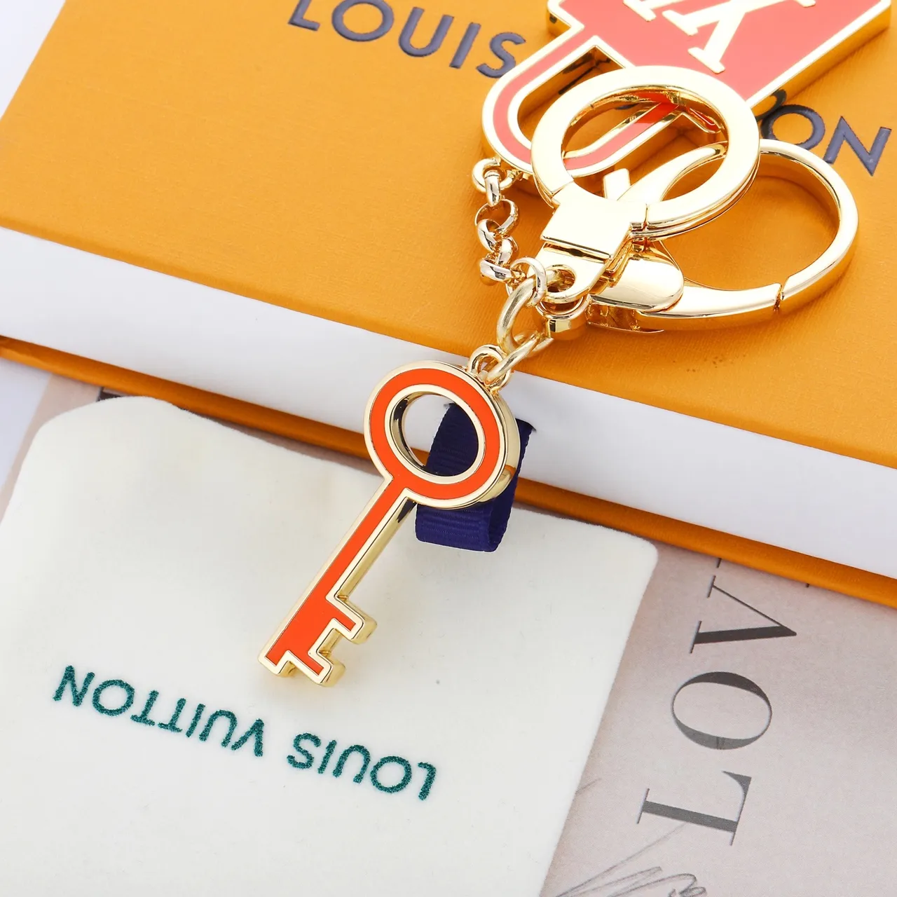 Louis Vuitton Lock & Key Laranja Dourado Metal Esmaltado Pulseira 4