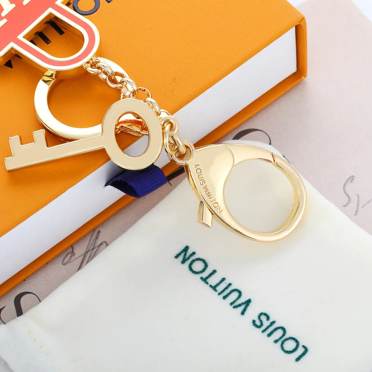 Louis Vuitton Lock & Key Laranja Dourado Metal Esmaltado Pulseira 7