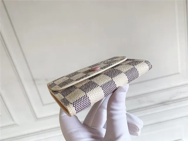 Louis Vuitton Monogram toile flap snap portefeuille court 20