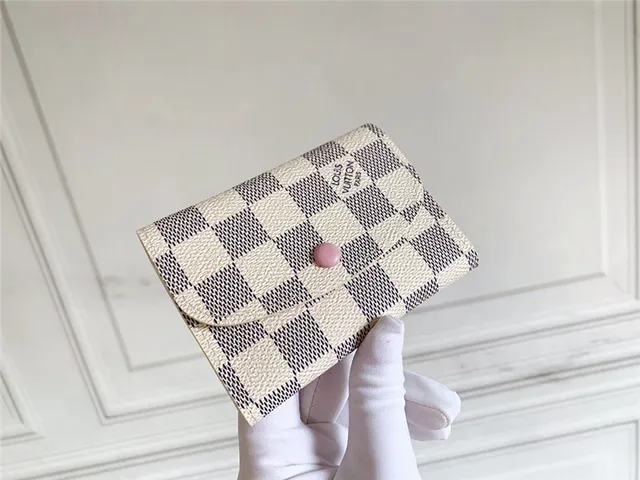 Louis Vuitton Monogram toile flap snap portefeuille court 21