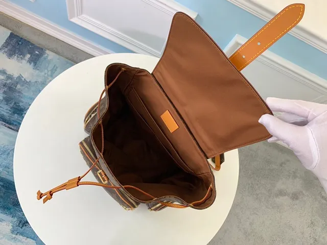 Louis Vuitton Montaigne Brown Beige Monogram Canvas Tan Leather Trim Casual Backpack 7