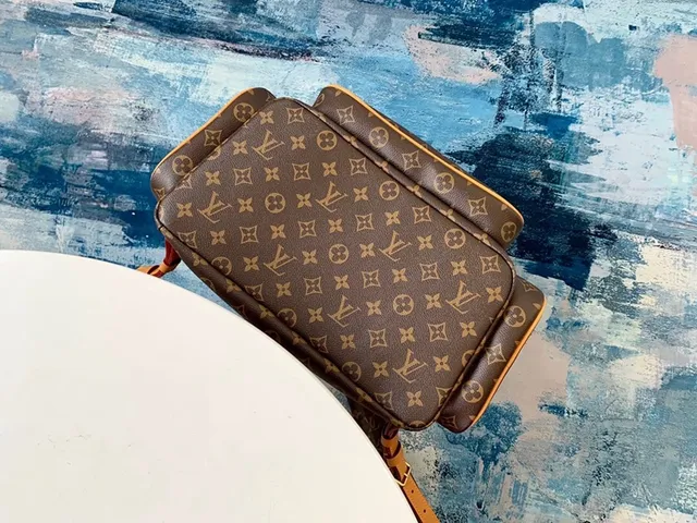 Louis Vuitton Montaigne Brown Beige Monogram Canvas Tan Leather Trim Casual Backpack 11