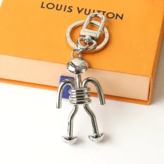 Louis Vuitton Silver Blue Polished Metal Figurine-Shaped Phone Accessory