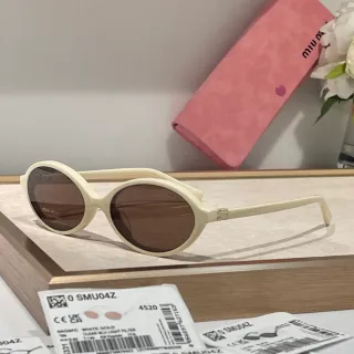 Miu Miu SMU04Z 奶油色椭圆形醋酸太阳镜