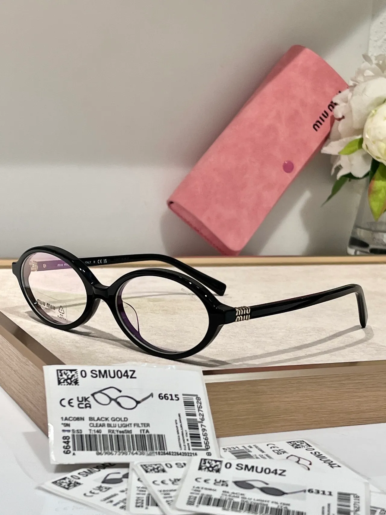 Miu Miu SMU04Z 奶油色椭圆形醋酸太阳镜 9