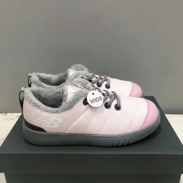 New Balance sneakers lifestyle noir blanc avec partie supérieure matelassée, col doublé en peluche 3