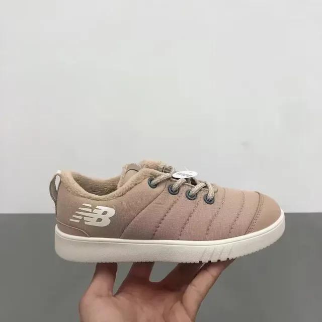 New Balance sneakers lifestyle noir blanc avec partie supérieure matelassée, col doublé en peluche 14