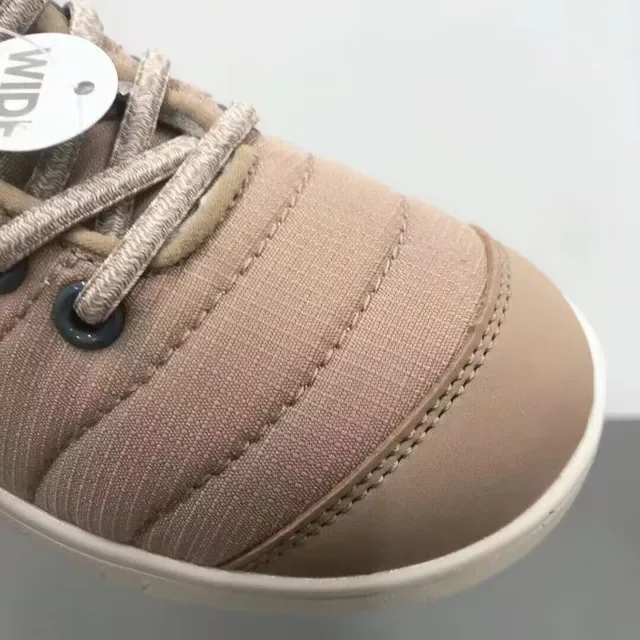 New Balance sneakers lifestyle noir blanc avec partie supérieure matelassée, col doublé en peluche 17