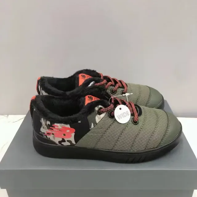 New Balance sneakers lifestyle noir blanc avec partie supérieure matelassée, col doublé en peluche 22