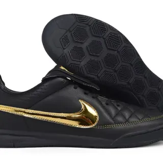 Nike Zapatos de fútbol indoor de cuero negro y dorado acolchado con upper metálico Swoosh