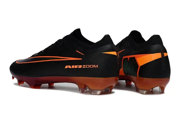 Nike Chaussures de football avec empeigne en maille noires et oranges, col bas, terrain ferme 3