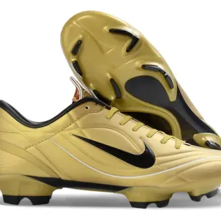 Nike Chaussures de football avec empeigne synthétique or noir métallique Swoosh et accents pour sol ferme