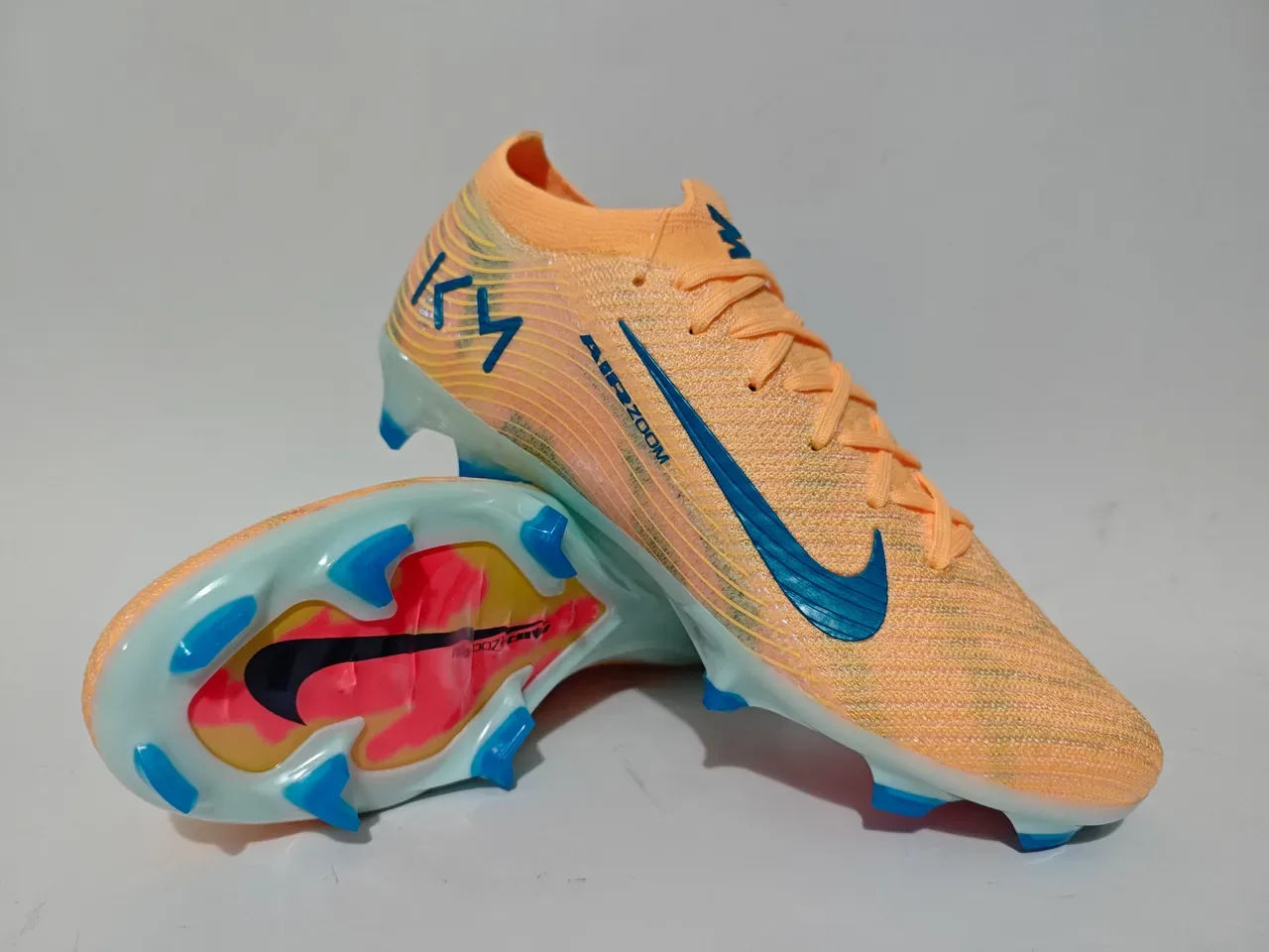 Nike Mercurial Vapor KM Peach Blue Botines de fútbol para terreno firme 11