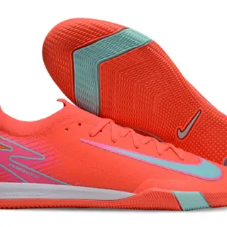 Nike Chaussures de football indoor orange rose avec upper tricoté et overlays synthétiques