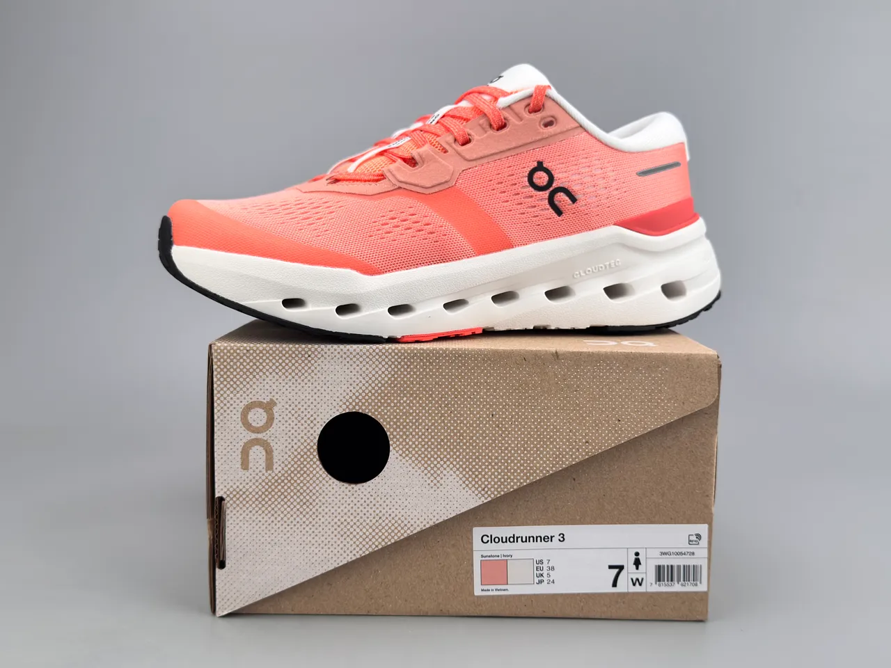Chaussures de course orange blanc avec upper mesh ingénierie ouvert hexagonal CloudTec Pods 2