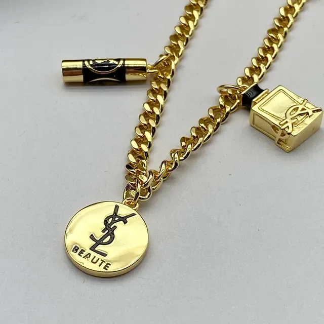 Saint Laurent Beauty Charm Gold Black Curb Chain Bracelet 2