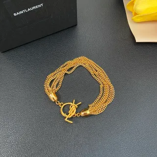 Saint Laurent स्वर्णिम बहु-तार कर्ब चेन चमकदार धातु कंगन