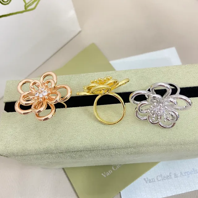 Van Cleef & Arpels Alhambra Gold Silver Openwork Floral Pavé-Set Center Brooch 2