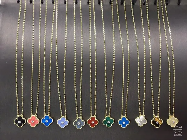 Van Cleef & Arpels Alhambra Quatrefoil Charm Necklace 5