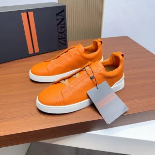 Zegna नारंगी पेबल्ड चमड़ा बिना लेस के स्लिप-ऑन लाइफस्टाइल स्नीकर्स