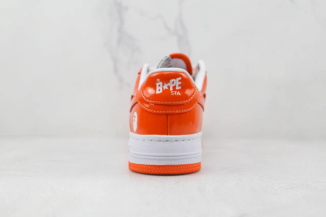 A Bathing Ape BAPE STA أحذية رياضية لايفستايل برتقالي وأبيض 9
