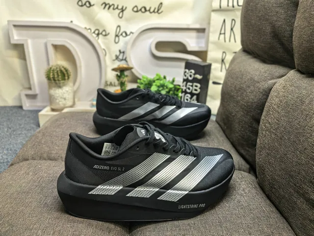 Adidas Adizero Evo SL 2 Off-White and Red Tênis de corrida 11