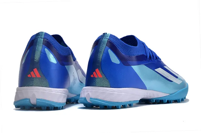Adidas Sapatos de futebol para grama artificial com upper de malha, cadarços assimétricos e corte baixo de cor azul 5