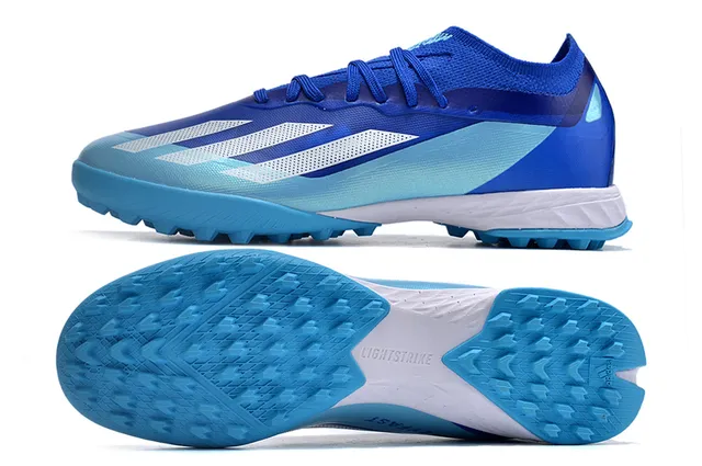 Adidas Sapatos de futebol para grama artificial com upper de malha, cadarços assimétricos e corte baixo de cor azul 6