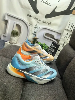 Adidas Tênis Running Azul Laranja com upper de malha engenheirada e overlay de três listras metálicas 9