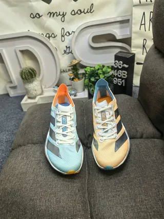 Adidas Tênis Running Azul Laranja com upper de malha engenheirada e overlay de três listras metálicas 10
