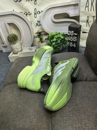 Adidas Green Silver Lightweight Racing Silhouette Mesh And Synthetic Overlay Construction Running Shoes 6