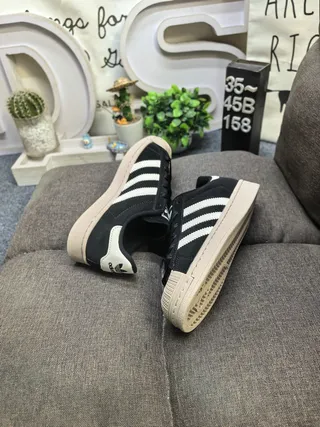 Adidas Superstar أسود وكريم حذاء رياضي أسلوب حياة 6