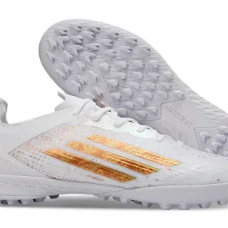 Adidas Sapatos de futebol turf low-cut com upper de malha sintética branco e ouro