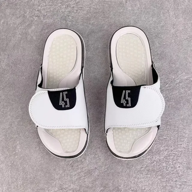 Chanclas slide Air Jordan Hydro 1 blanco y negro 4