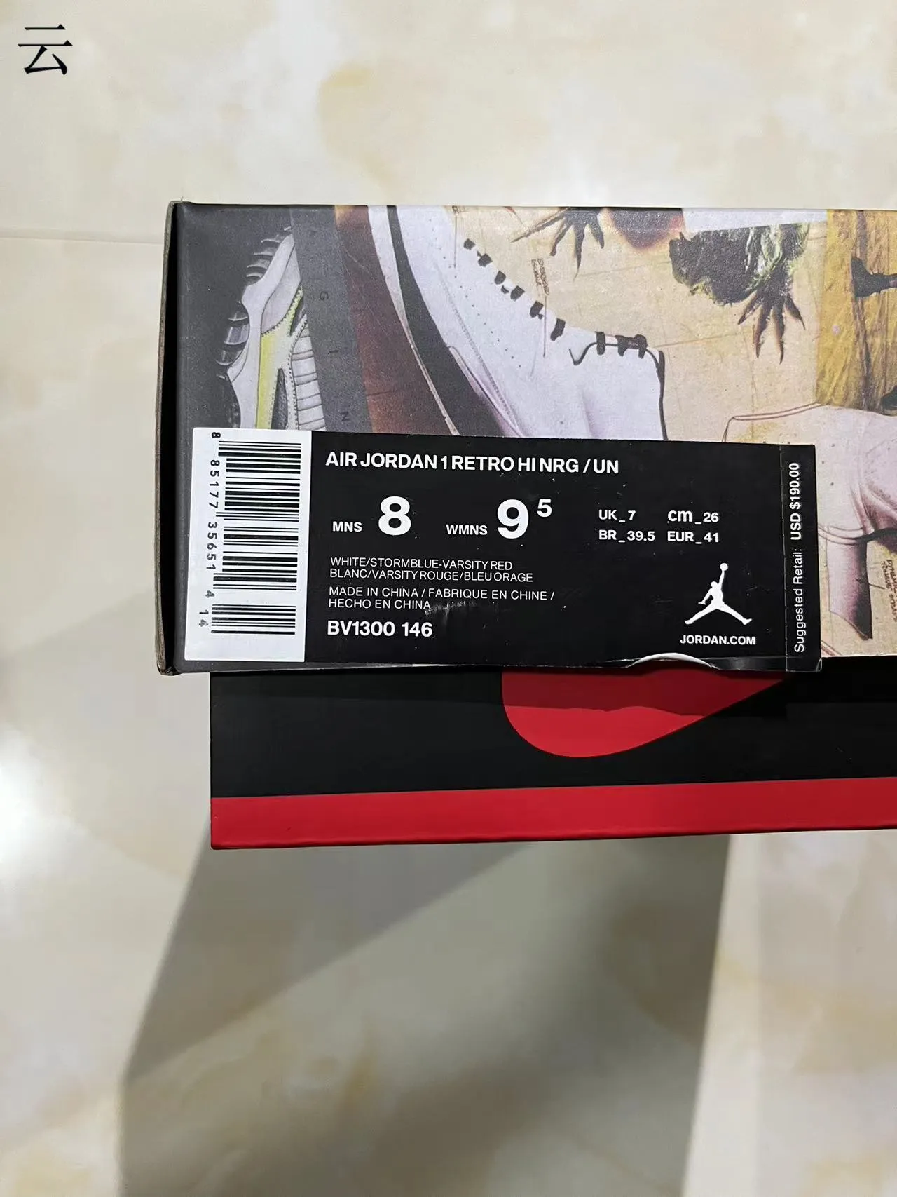 Zapatillas de baloncesto Air Jordan de caña alta con paneles de cuero en azul marino y blanco 10