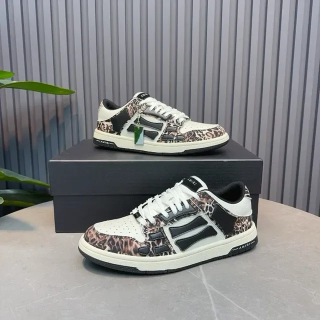 Amiri MA Court zapatillas de estilo de vida con estampado de leopardo negro y blanco 3