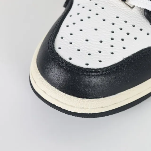 Amiri Skel Top Low Negro Blanco Crema zapatillas lifestyle 5