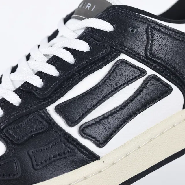 Amiri Skel Top Low Negro Blanco Crema zapatillas lifestyle 6