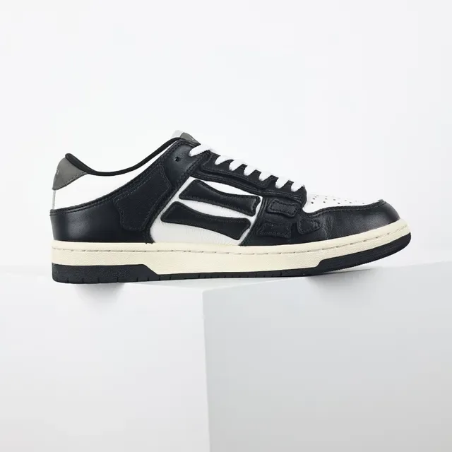 Amiri Skel Top Low Negro Blanco Crema zapatillas lifestyle 7