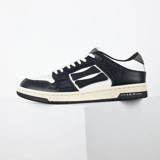 Amiri Skel Top Low Negro Blanco Crema zapatillas lifestyle 9