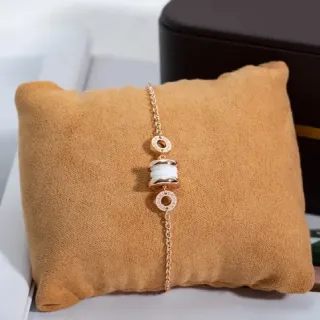 Bvlgari B.zero1 सफेद सिरेमिक और गुलाबी सोने के टोन चेन ब्रेसलेट