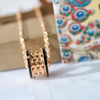Bvlgari Bulgari Gold Black Stacked Ring Pendant Spiked Pyramid Motifs Necklace