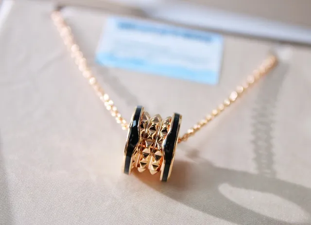 Bvlgari Bulgari ذهب أسود مكدس حلقة معلق نماذج هرمية مدببة قلادة 6