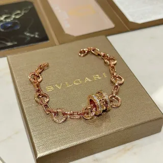 Bvlgari सोना चांदी चेन लिंक मल्टी रिंग घूमता सेंटरपिस ब्रेसलेट