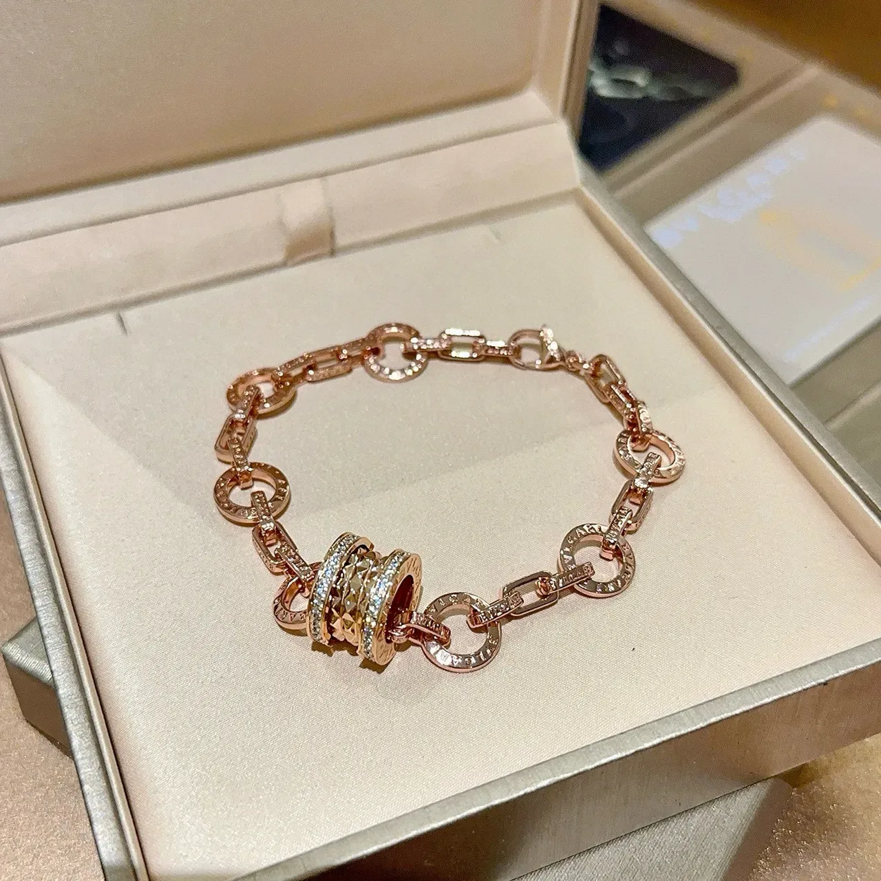 Bvlgari सोना चांदी चेन लिंक मल्टी रिंग घूमता सेंटरपिस ब्रेसलेट 4