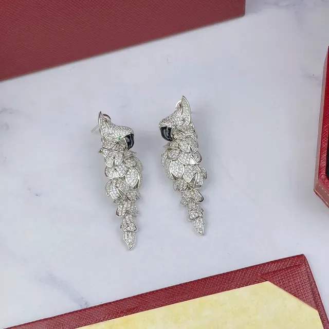 Cartier أقراط فضة أسود بلوريات شكل ورقة عين أونيكس 7