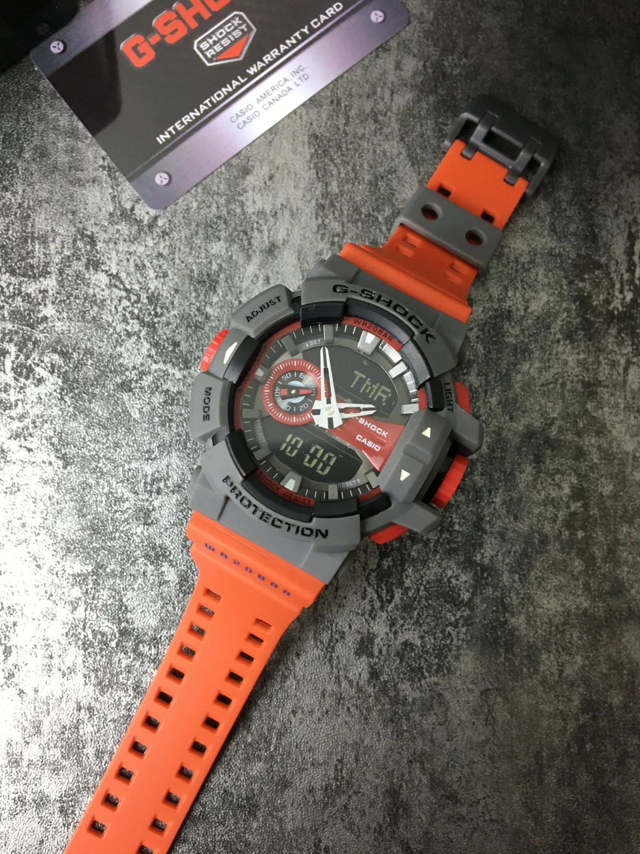 Casio G-Shock GA-100 برتقالي و رمادي ساعة رياضية 6