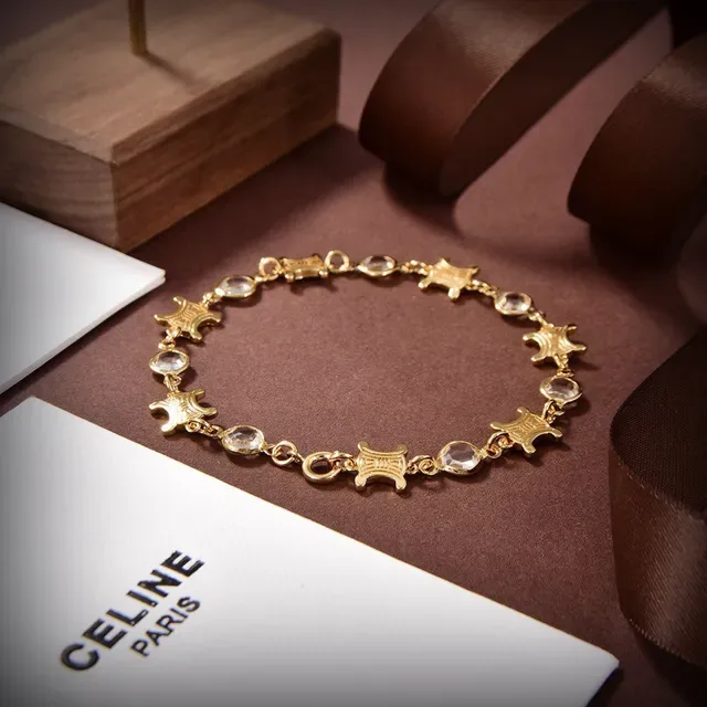 Celine Triomphe Pulsera de eslabones con piedras facetadas en tono dorado 2