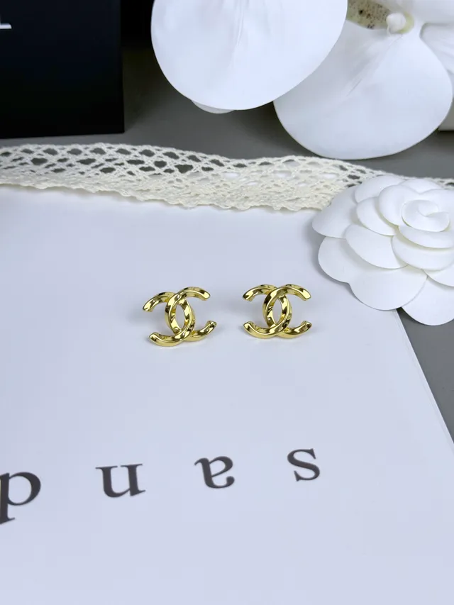 Chanel CC Logo Boucles d'oreilles or noir entrelacées métal poli 6