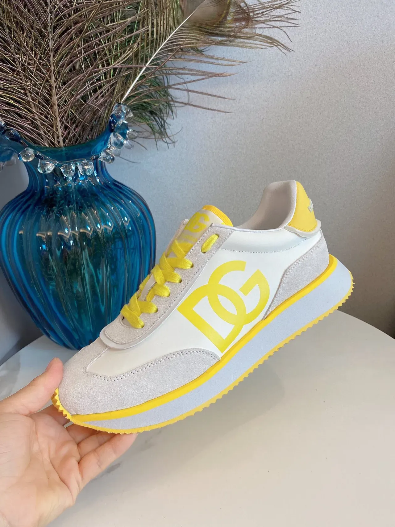 حذاء رياضي DC Shoes بيج أصفر لون low-top مزين بشعار 7